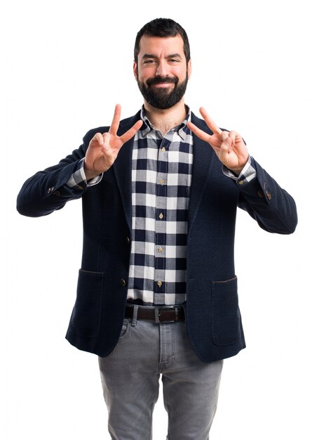 Man doing victory gesture