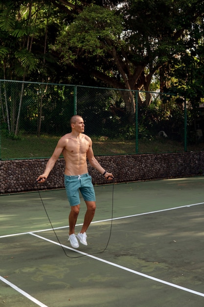 A man doing with rubber bands. bali