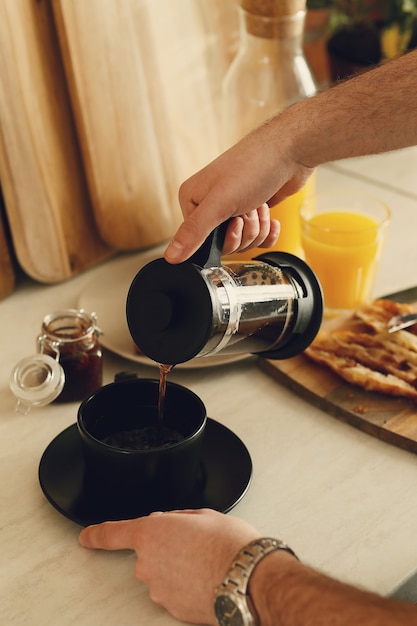 Man drinking coffee. Breakfast morning