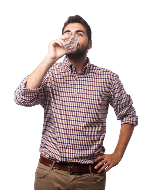 Man drinking from a glass