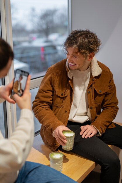 Man drinking matcha tea