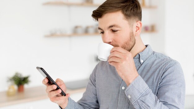 Man enjoying coffee while drinking coffee