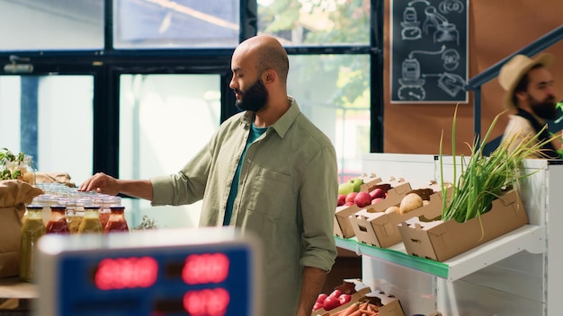 Man examining organic pantry supplies