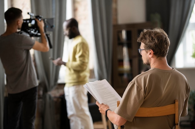 Man filming with a professional camera