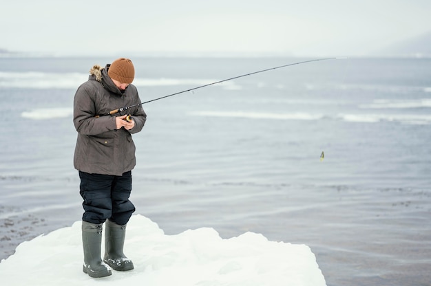 Man fishing with special equipment