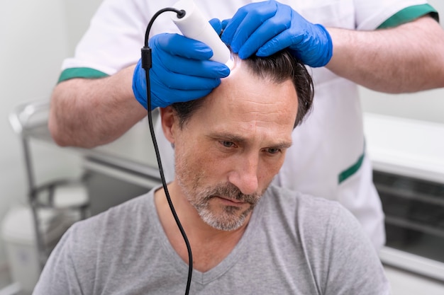 Man getting a hair loss treatment