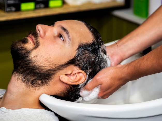 Man getting a hair wash