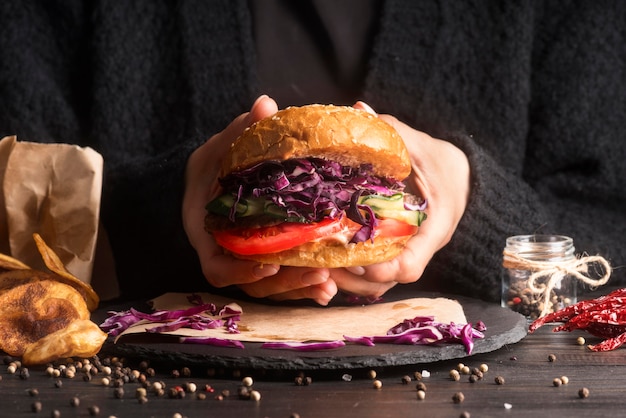 Man getting ready to eat a hamburger