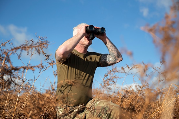 Free photo man getting ready for his mission