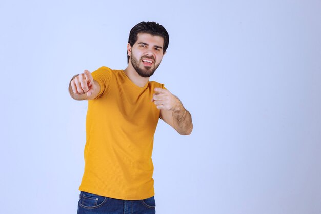 Man giving smiling and cheerful poses.