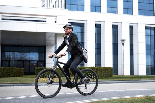 Man going to work on bicycle full shot