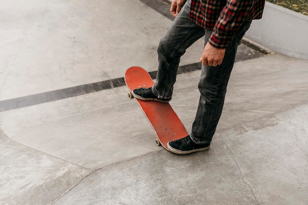 Man having fun with skateboard outdoors