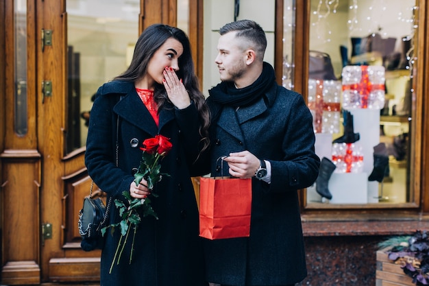 Man having gift for beautiful girlfriend