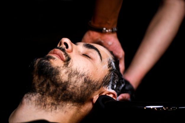 Man having his hair washed at the salon