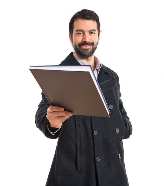 Free Photo man holding a book