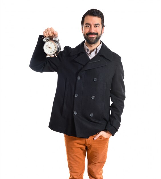 Man holding a clock