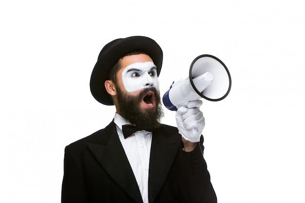 Man holding megaphone make loud noise