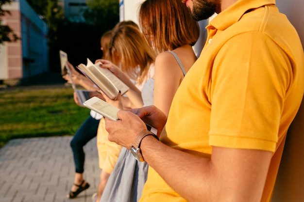 Free photo man holding mobile phone in hands. people using device concept.