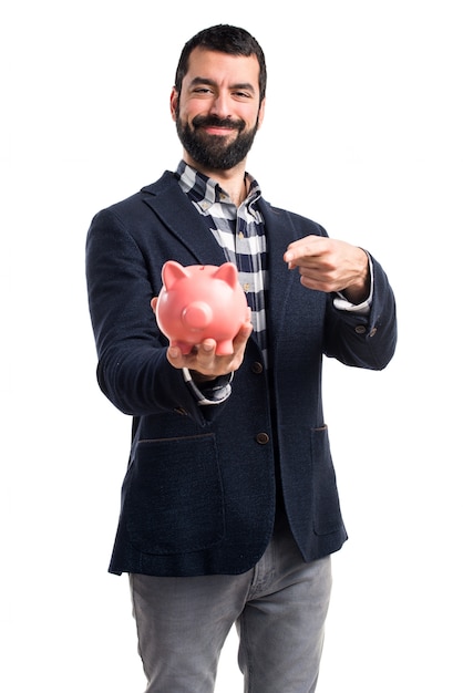 Man holding a piggybank