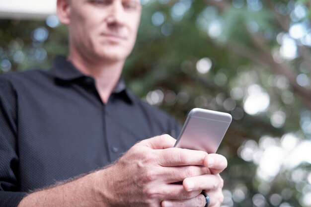 Man Holding Smartphone