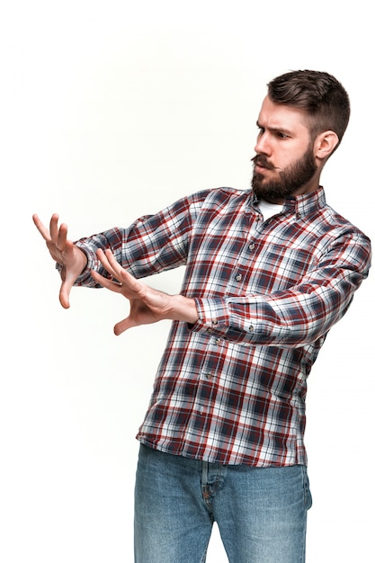 Man is looking scared. Over white background