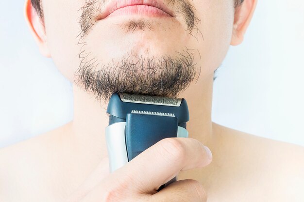 Man is using shaver