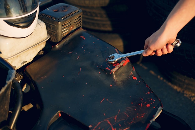 Man in a karting circuit with a car