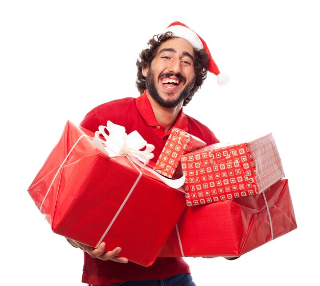 Man laughin gwith santa's hat with many gifts