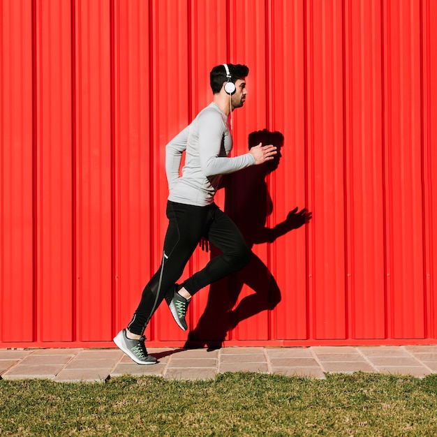 Man listening to music and running