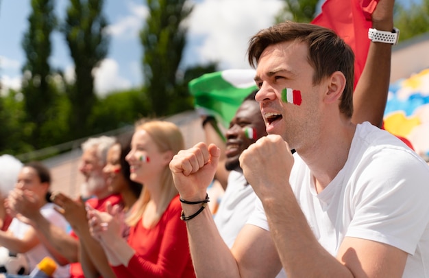 Man looking at a football game