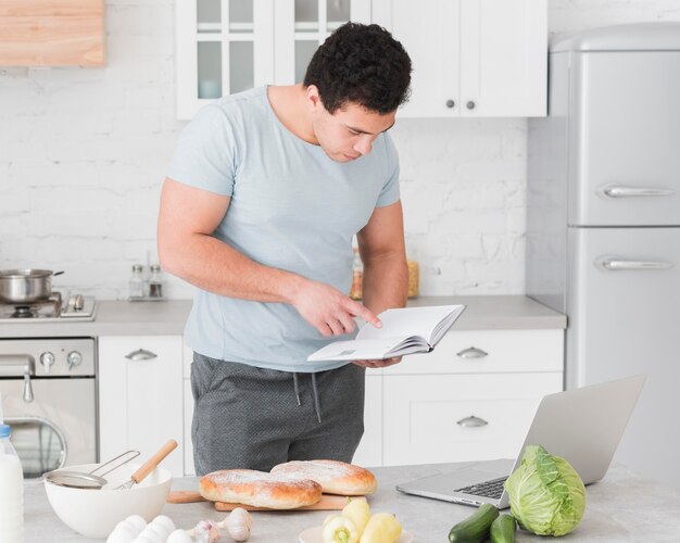 Man looking from recipes online