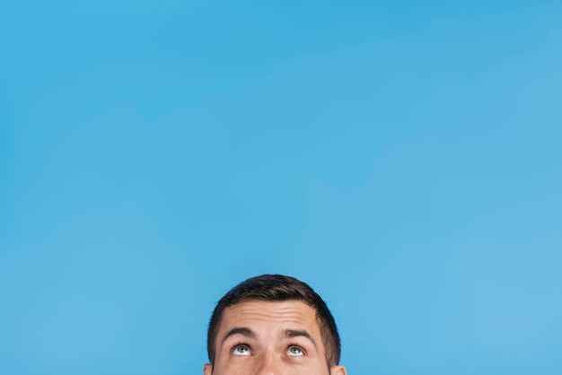 Man looking up with copy space