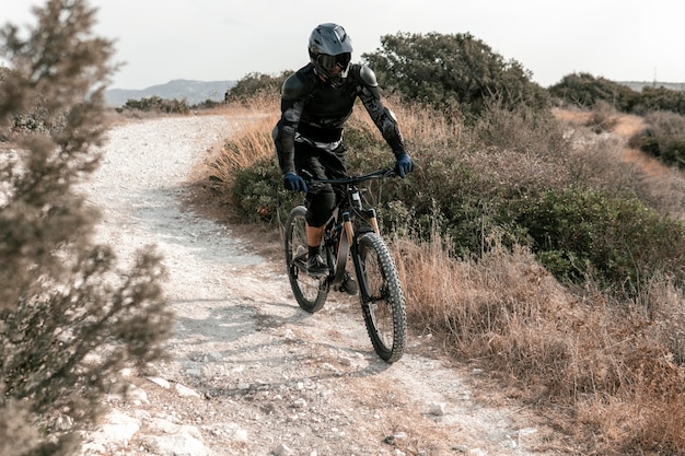 Man in mountain biking equipment outdoors