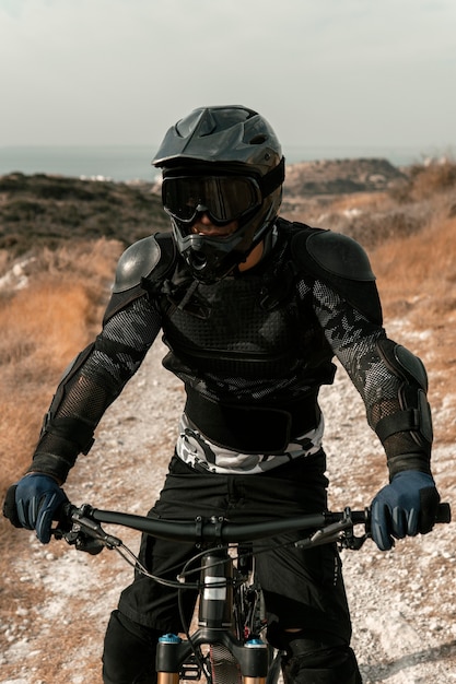 Free photo man in mountain biking equipment