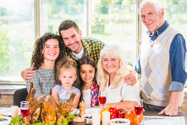 Man near woman, children and elderly couple