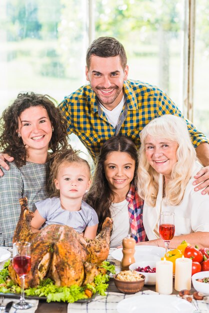 Man near woman, children and elderly lady