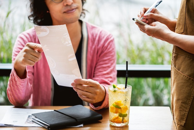 Man ordering food at the restaurant