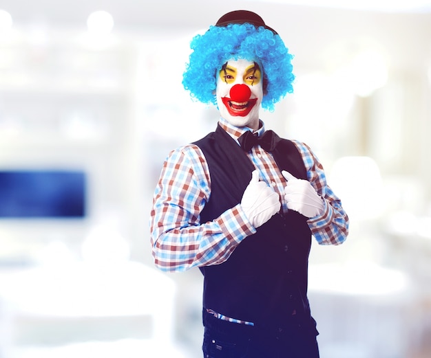 Free photo man painted clown