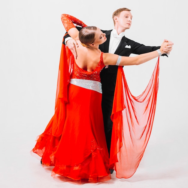 Man performing ballroom dance with woman