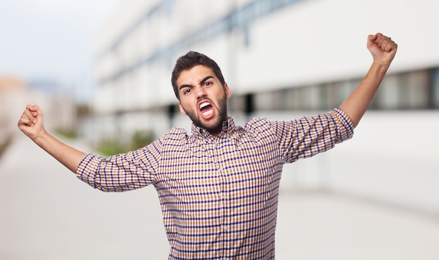 Man in plaid shirt representing anger. 