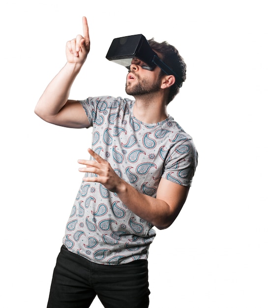 Free Photo man pointing with virtual reality glasses