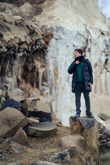 Free Photo man poses in the quarry