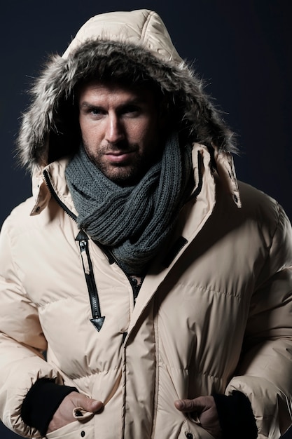 man posing and wearing a winter jacket