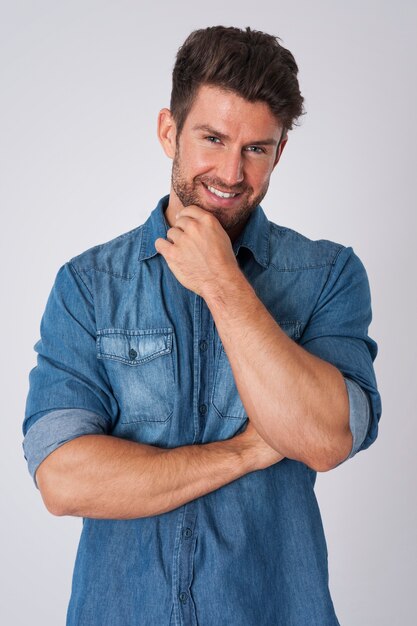 man posing with denim shirt