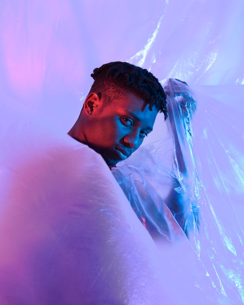 Man posing with plastic foil