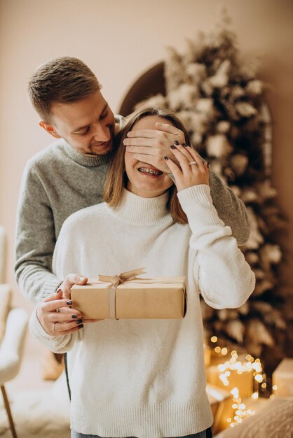 Man presenting gift for christmas