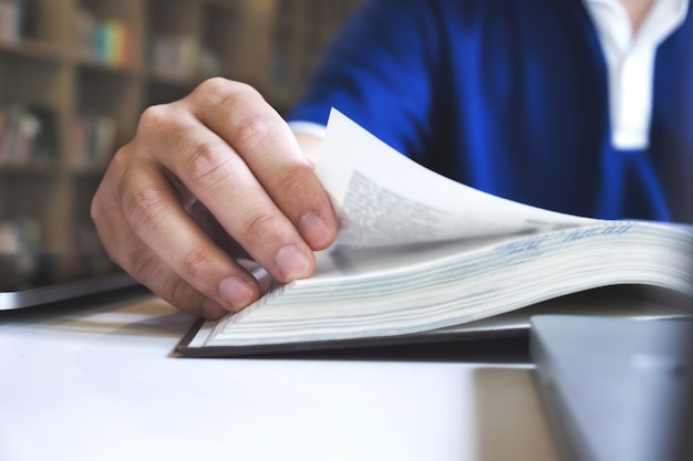 Man reading a book. Education, Academic, Learning and Exam concept.