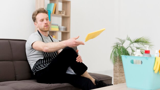 Man resting after cleaning