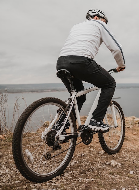 Man riding a bike outdoors