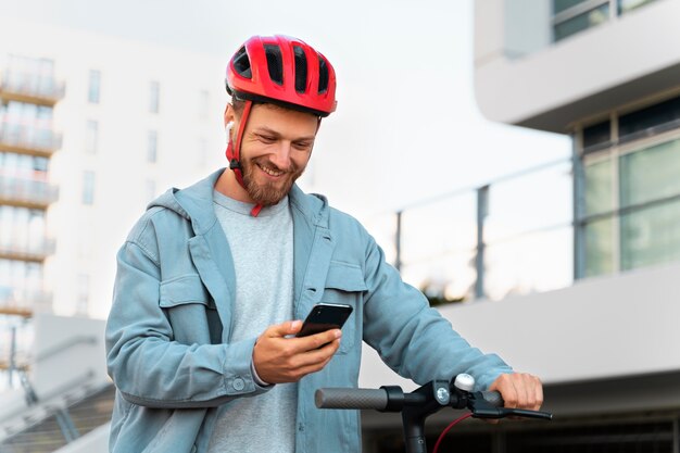 Man riding an eco friendly scooter in the city